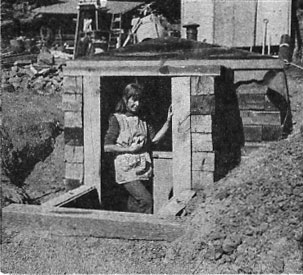 Root cellar Joanie in doorway